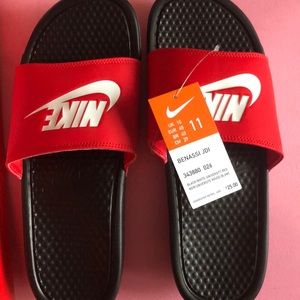Red and black nike slides